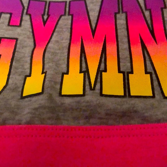 A justice sports bra with gymnastics written on it - Picture 2 of 3